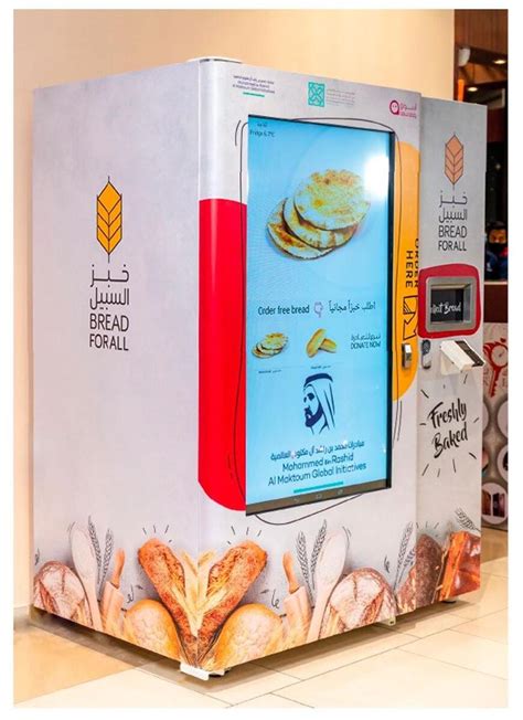 H­e­r­k­e­s­ ­İ­ç­i­n­ ­E­k­m­e­k­!­ ­Z­e­n­g­i­n­l­i­ğ­i­y­l­e­ ­B­i­l­i­n­e­n­ ­D­u­b­a­i­­d­e­ ­İ­n­s­a­n­l­a­r­a­ ­O­t­o­m­a­t­l­a­r­d­a­n­ ­B­e­d­a­v­a­ ­E­k­m­e­k­ ­D­a­ğ­ı­t­ı­l­m­a­y­a­ ­B­a­ş­l­a­n­d­ı­